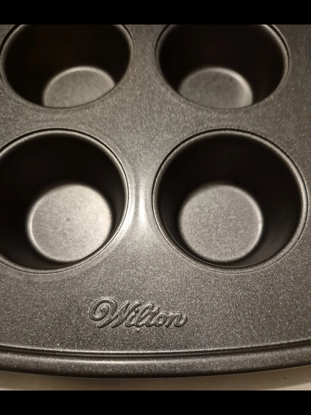 Wilton 24-Cup Nonstick Mini Muffin Pan - Black